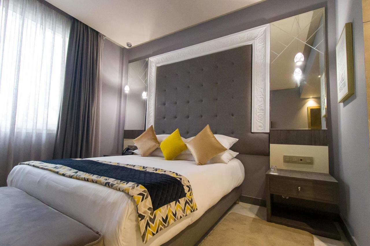 Mandarin Palace Hotel & Spa Tanger Ngoại thất bức ảnh A bedroom at the hotel