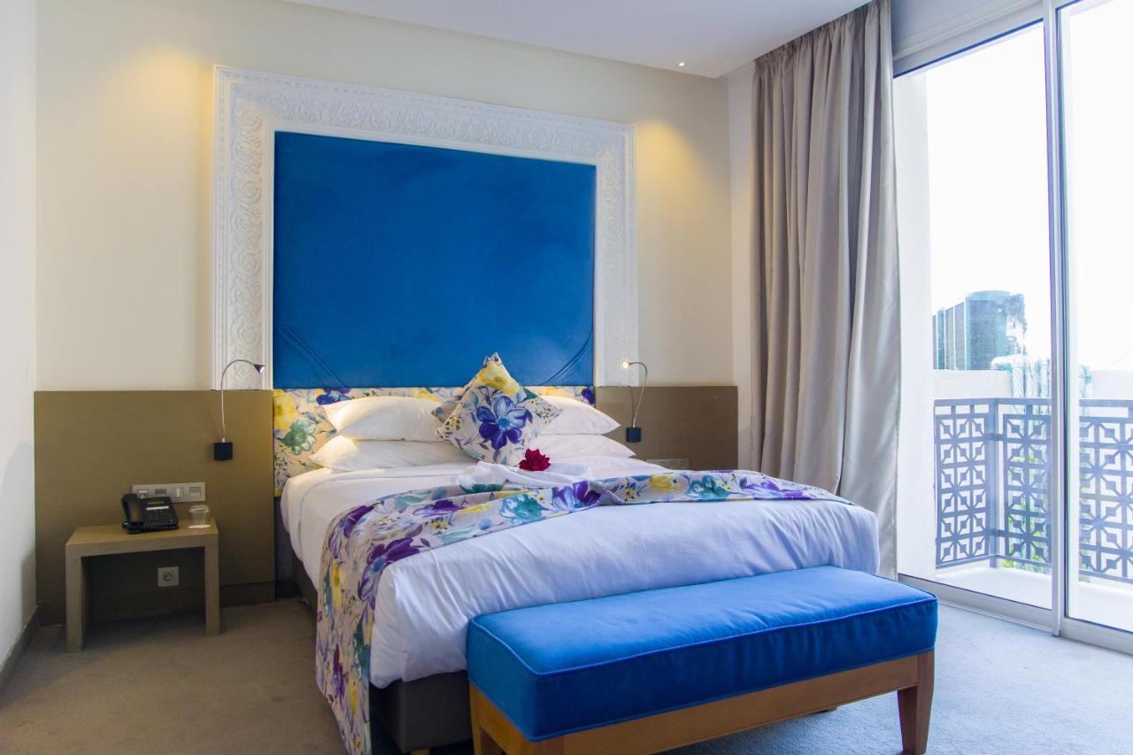 Mandarin Palace Hotel & Spa Tanger Ngoại thất bức ảnh A bedroom at the hotel